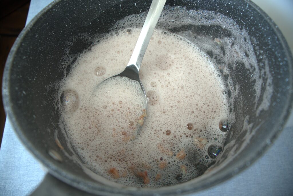 a melted soap bar in a pot.
